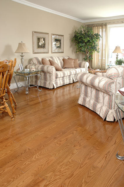 wide plank red oak wood flooring in a living room