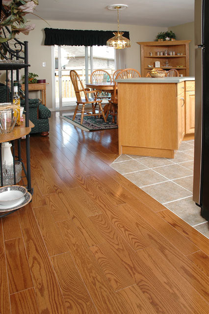 red oak honey wood flooring in a kitchen