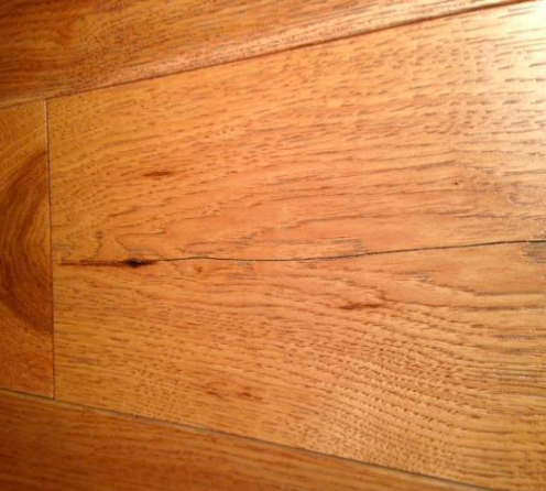 Cracked wood flooring board 