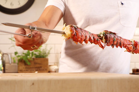Lobster Tails Cooked on a Souvla Skewer over coals on a Cyprus BBQ