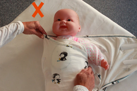 How to swaddle -what not to do