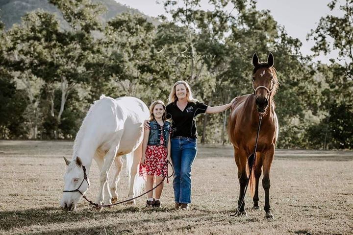 family photo featuring survivor of equestrian accident