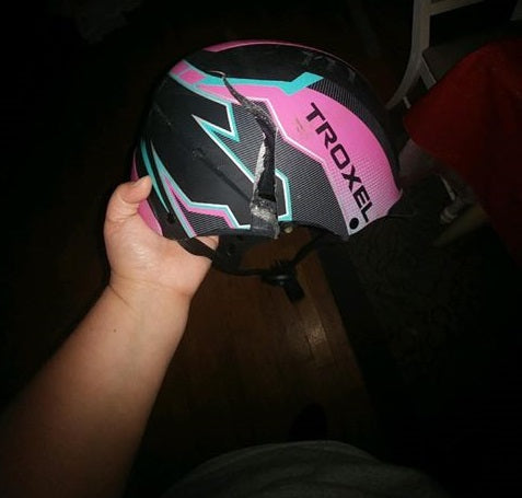 broken troxel helmet after accident