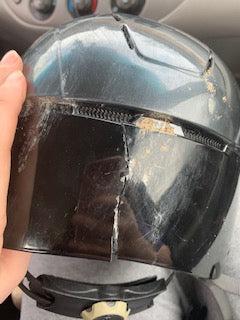 broken troxel helmet after accident