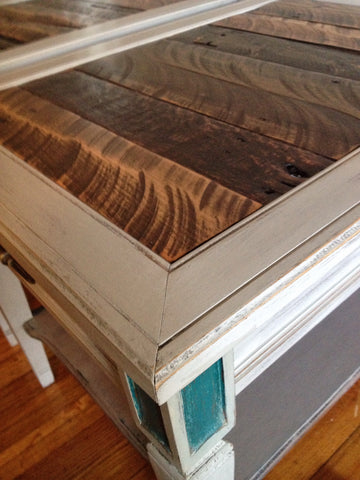Reclaimed wood slats inside framed top