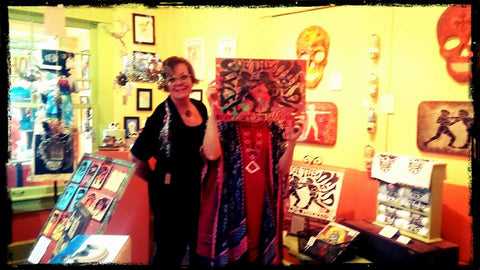 "Calavera Prelude" Through Oct 29 An art celebration and fundraising show for Bare Hands 14th Day of the Dead Festival! Here with Kim Graham Smith and an anonymous lady hiding behind Andrew Cost art