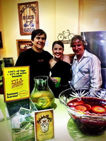 Matthew Lane and board members of bare Hands' Day of the Dead Festival are serving sangria during the opening reception for Calavera Prelude, an art celebration and fundraising show for Bare Hands 14th Day of the Dead Festival! 10% of show sales benefit the Festival.
