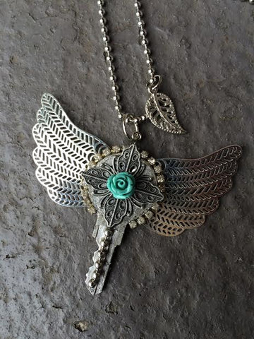 Winged key necklaces by local maker Victoria Puckett. $30.00.