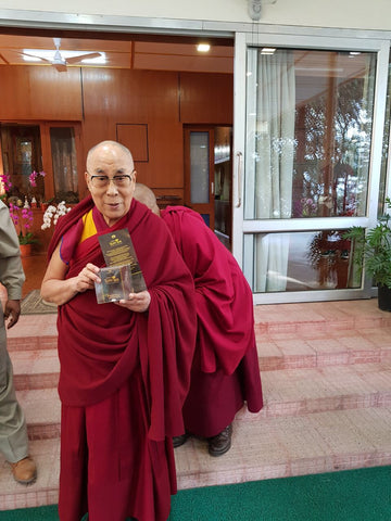 The Dalai Lama visiting the Temi Tea Estate, offering smiles and blessings