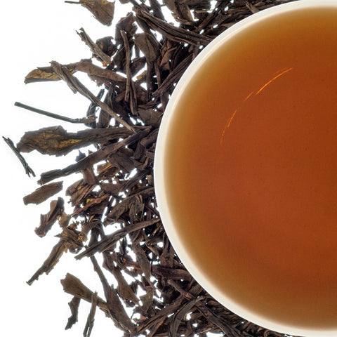 Loose leaf and steeped cup Hojicha Japanese green tea