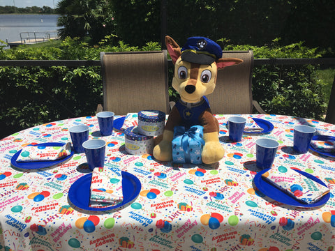 Chase from Paw Patrol is on the case with Happy Birthday Tablecloth by CelebrationTablecloths