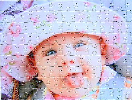 500 piece custom puzzle cut showing family photo of baby as a jigsaw puzzle