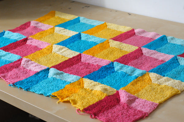 Brightly coloured baby blanket