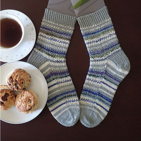 Cranberry biscotti socks with tea and scones