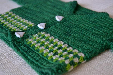 Shackleton crochet baby sweater with sailboat buttons