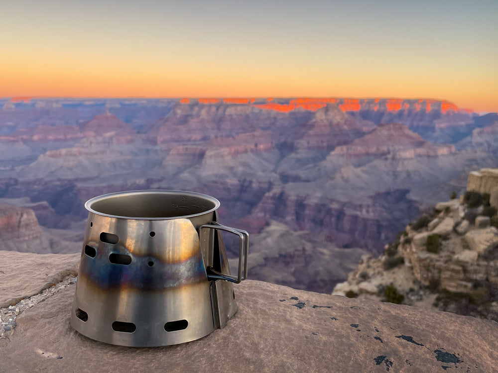 Ryan Lim also sends us this picture of his Sidewinder Ti-Tri being upstaged by the first light of the Grand Canyon!