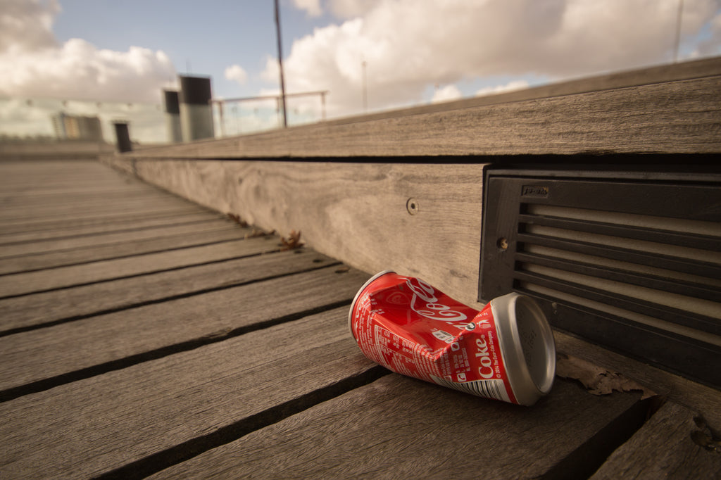 Coke can abandoned on the street