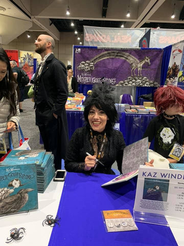 Kaz (Mother Goth Rhymes) signing her new book! You can see Stabby the Unicorn in the background!