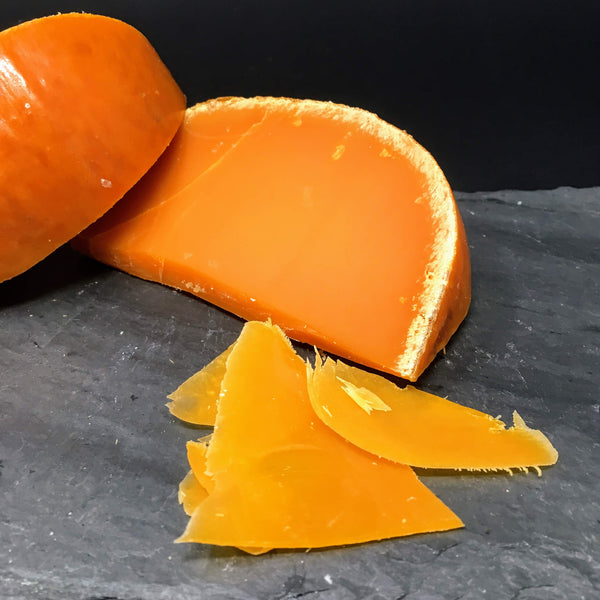 Mimolette Cheese Aged 24 Months Imported From France Cheesyplace 