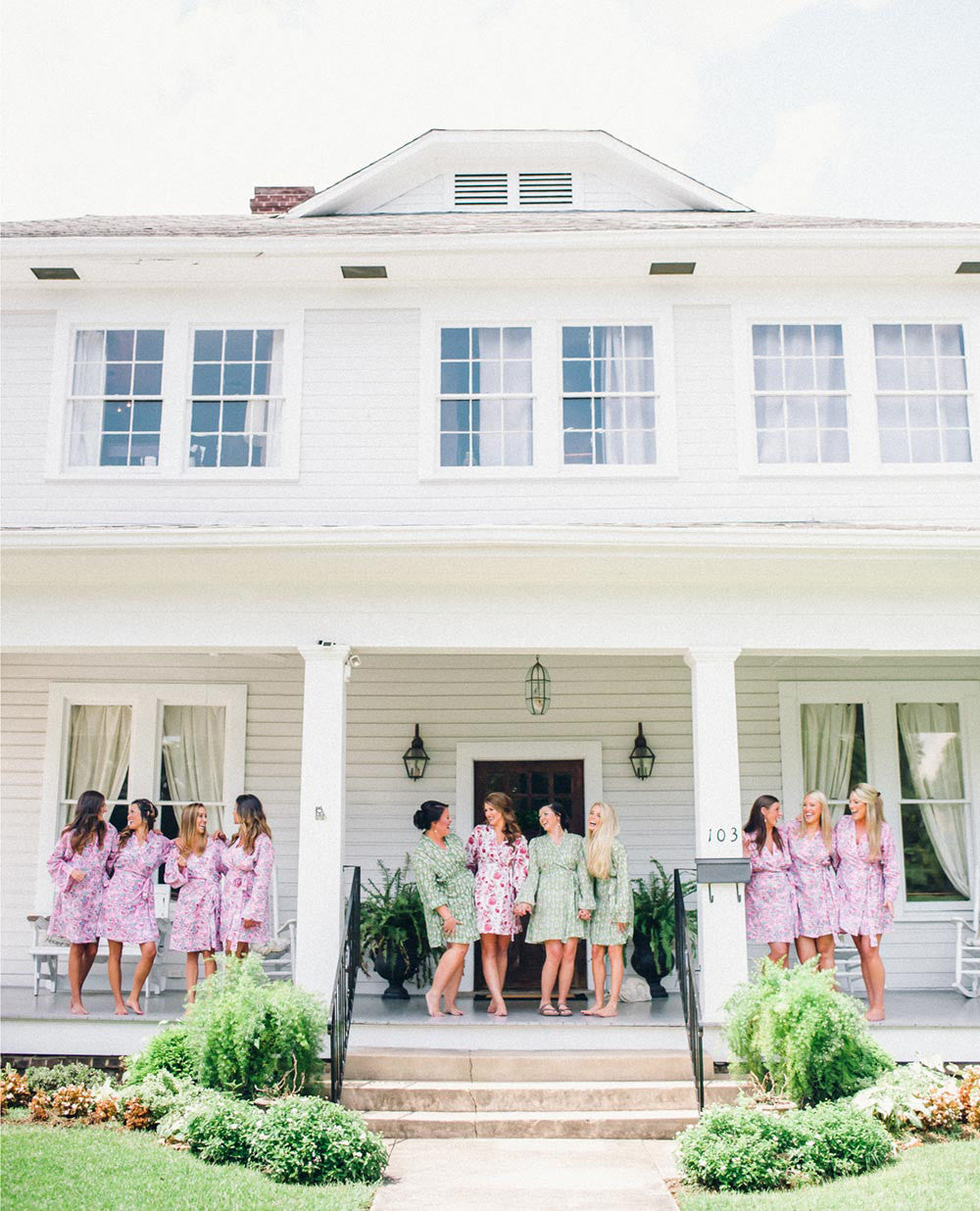 bridesmaids in robes outdoors