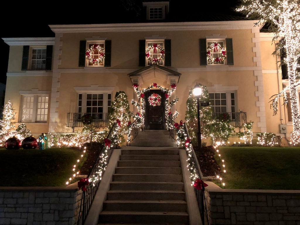 Classic Dyker Height Christmas lights on a traditional home