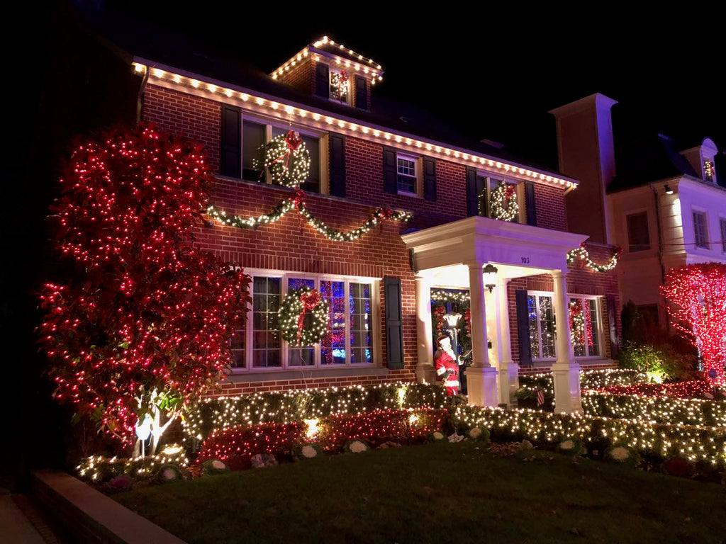 Santa greets visitors at this jolly home