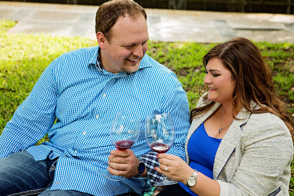 Bride and Groom toasting with Wine Outdoors