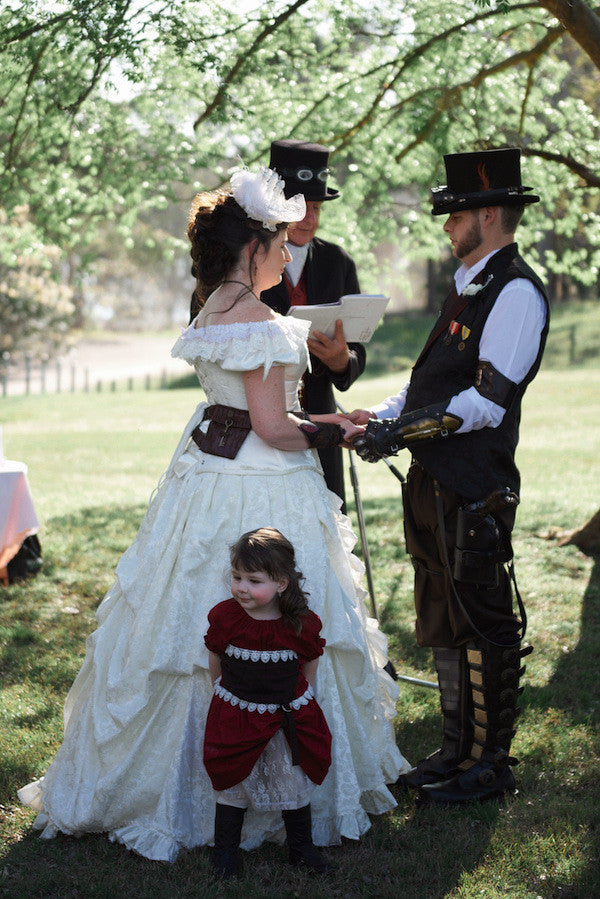 steampunk pastor marrying steampunk couple with child