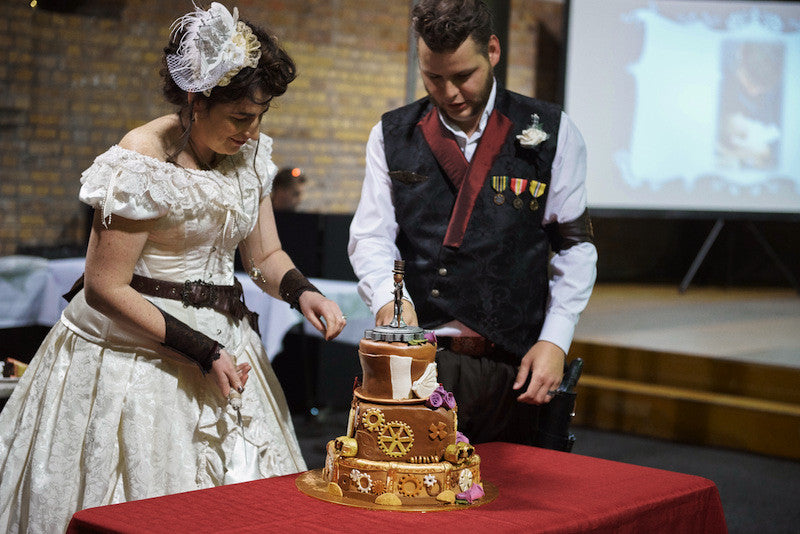 steampunk couple the Nortons with their steampunk wedding cake