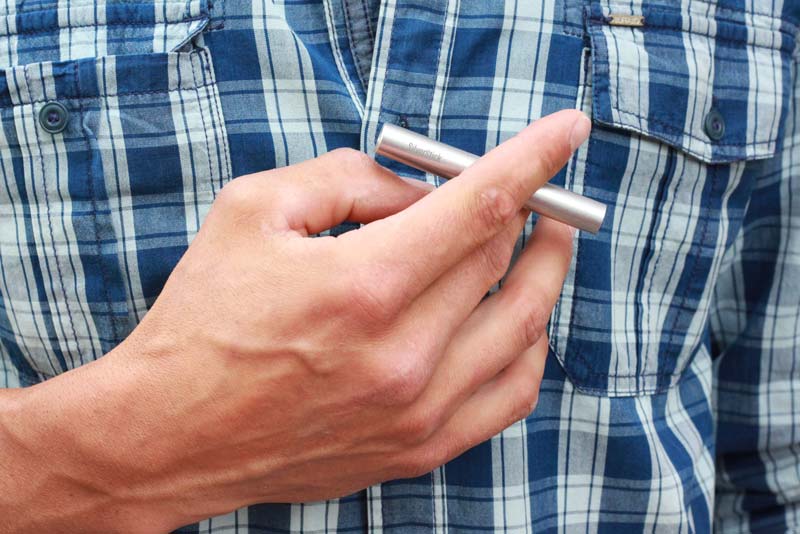 hand holding SilverStick pipe with a filter