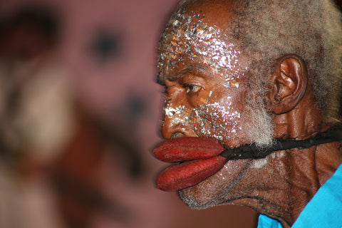 A photograph of a Cuban man during Carnival 2004 shot by Christopher Porche-West.