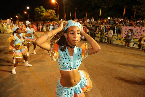 A Cuban girl dancing during Carnival 2004 by Christopher Porche-West.