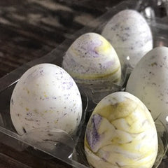 Speckled Easter Egg With Poppy Paint Added to Color Melted Chocolate