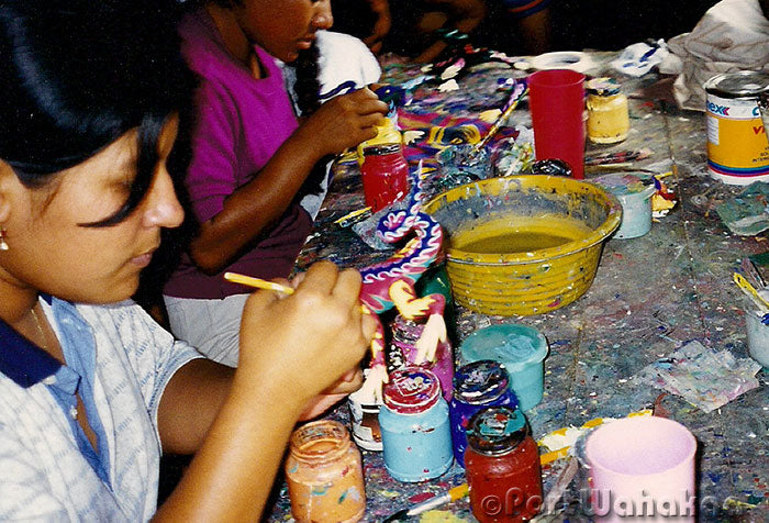 Daughters Painting Oaxacan Wood Carvings