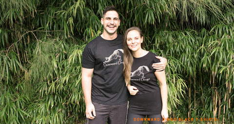 man and woman wearing Downward Dingo Australian yoga wear T shirts.