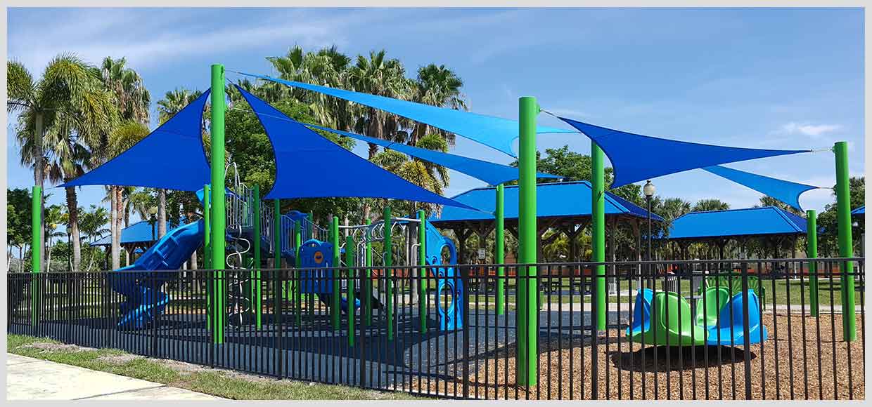 Blue sails on a blue and green playground