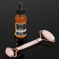 Rose quartz facial massage roller clean kiss serum
