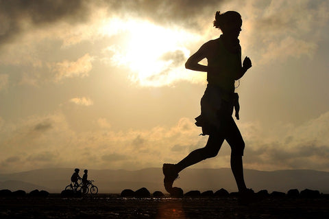 woman running silhouette