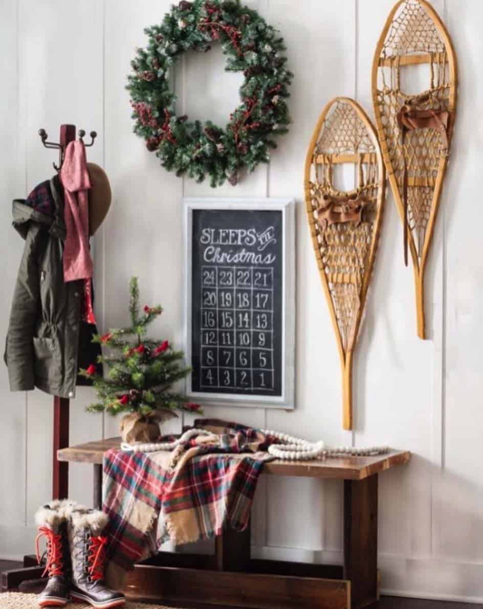 onekindesign - hang snowshoes holiday entryway