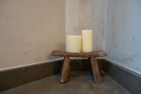 Wooden stool as candleholder