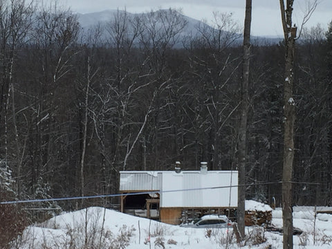 Sap Hound Maple's Sugarhouse with Pleasant Mountain the background.