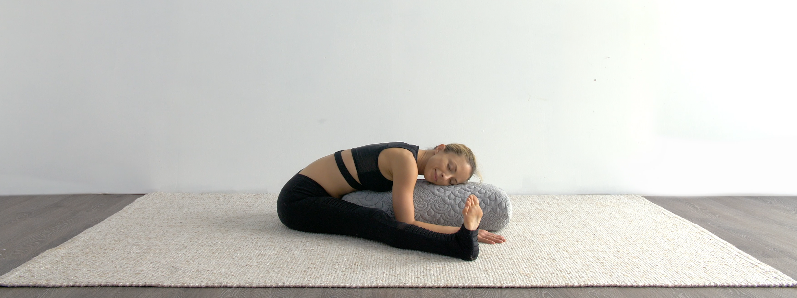 How To Use A Yoga Bolster with Angela Kukhahn