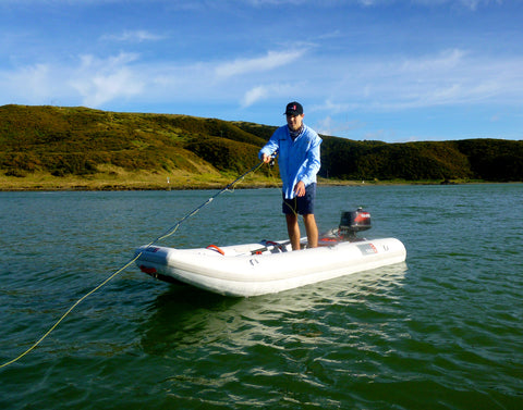 Standing up in folding inflatable boat to cast out
