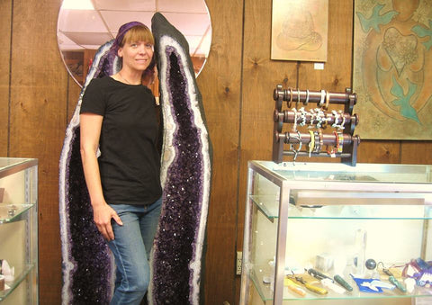 owner Stacie Anthony with pair of Amethyst cathedrals from Brazil