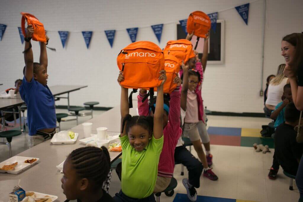 kids with their new backpacks!