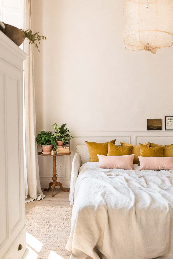 modern vintage bedroom decor in pink and mustard