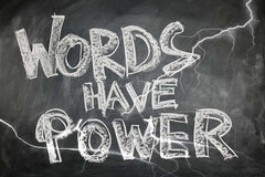 Words have power - chalked on blackboard.