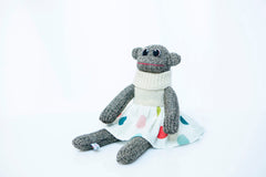 Red Rufus SockMonkey in a skirt and jumper, handmade in Ireland.