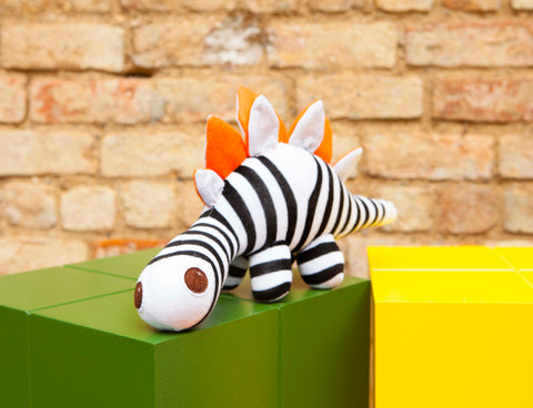 Darcy SocKDino, black and white striped dinosaur with orange spikes, felt eyes|Red Rufus