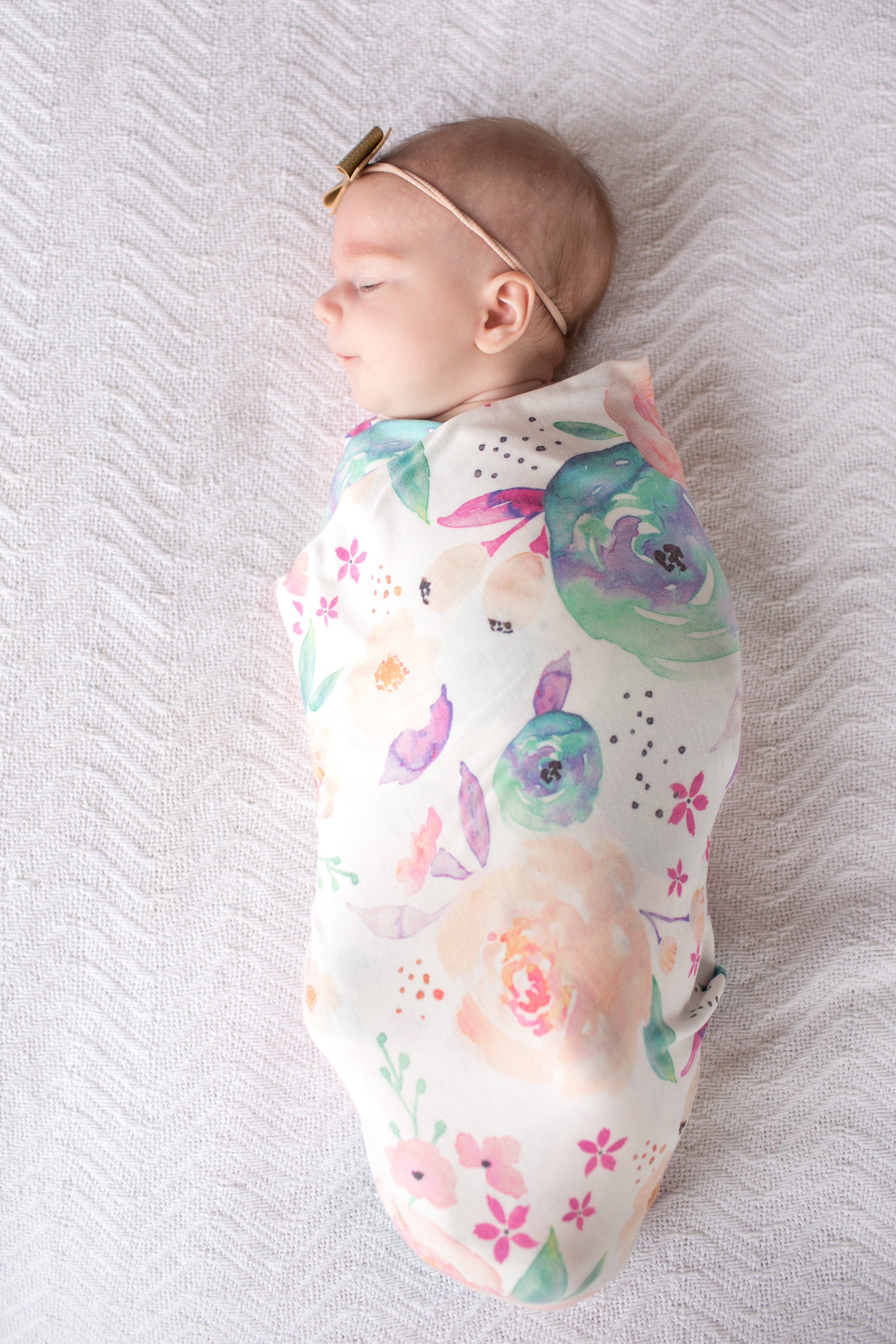 matching swaddle and bow